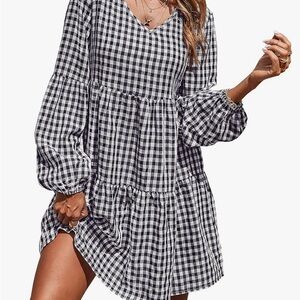 Cute black and white dress. New with tags. Never worn.